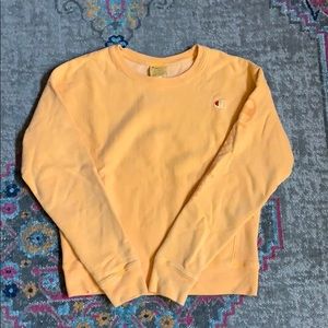 Orange champion crewneck.